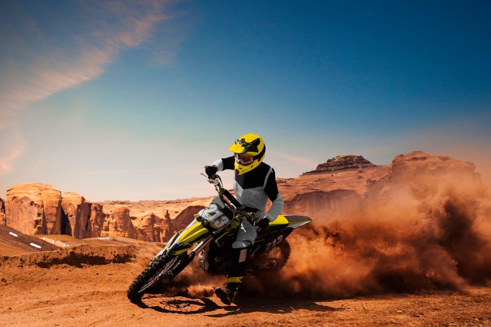 Pro motocross rider jumping on a dirt track in full race gear symbolizing the path from amateur to professional racing